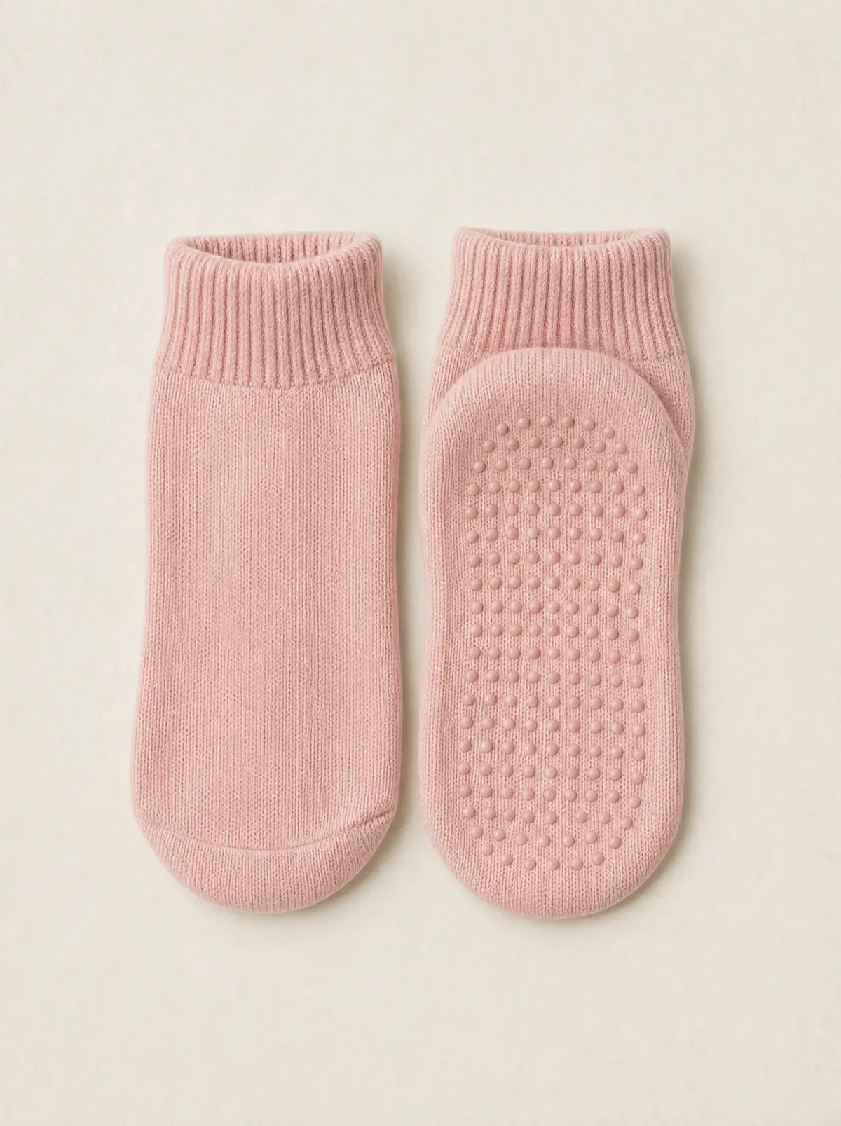 Blush closed-toe ankle grip socks, flat lay